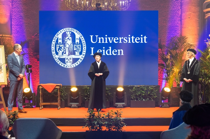 The new Executive Board at Leiden University (l-r): Martijn Ridderbos, Annetje Ottow and Hester Bijl standing on the stage at the Dies Natalis.