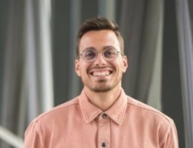 Smiling young man in dress shirt