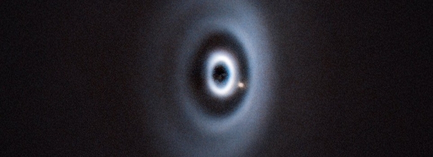 The newborn planet WISPIT 2b is eating its way through its dusty “cradle” as it orbits its parent star. This image, taken with ESO's Very Large Telescope, is the first clear image of a baby planet in a multi-ringed disc.