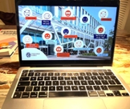 Laptop of Jasper with the presentation of the opening of the academic year on the screen